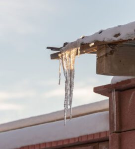 spring snow american custom contractors roof in need of repair